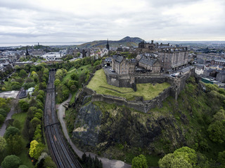 Edinburgh city historic Castle on Rock cloudy Day Aerial shot 5