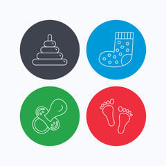 Footprint, pacifier and socks icons. Pyramid toy linear sign. Linear icons on colored buttons. Flat web symbols. Vector