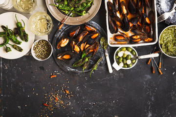 Dinner Table With Mussels, Grilled And fresh Vegetables. Copy Space