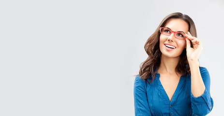 Portrait of happy businesswoman in glasses
