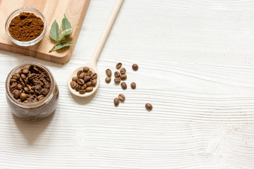 homemade coffee-sugar scrub top view wooden background