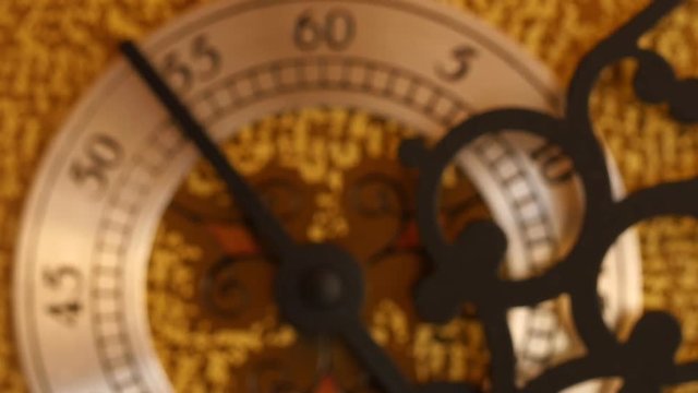 Closeup dolly shot of the second hand on grandfather clock