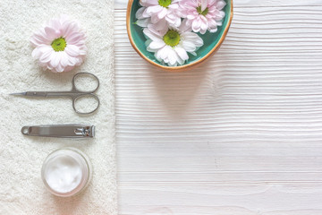 Fototapeta premium oil and cream for nail care in spa top view