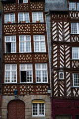 Old timber-framed, crooked  building in the city of Rennes, France