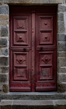 Crooked old door in the city of Rennes, France