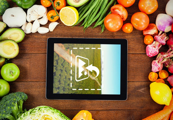 Tablet Surrounded by Produce Mockup - Powered by Adobe