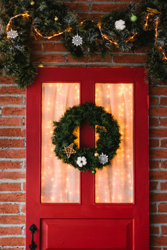 Christmas Wreath On Red Door