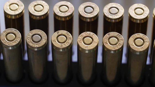 Dolly shot of large caliber ammunition bullets