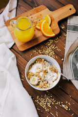 healthy breakfast bowl of yogurt with granola and eggs