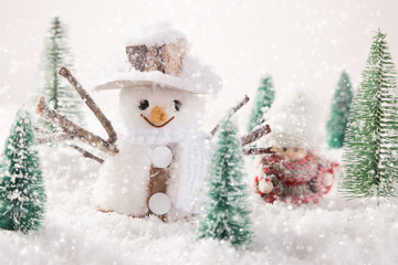 Christmas snowmen on abstract background
