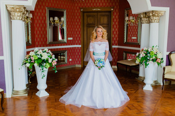 Portrait of a bride in a beautiful classic interior