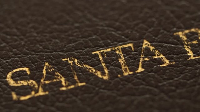 A closeup dolly shot of spanish bible