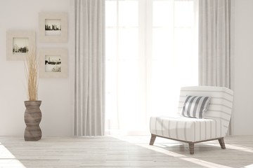 White room with armchair. Scandinavian interior design