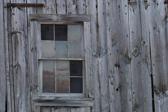 Old Barn Window and Gray Siding
