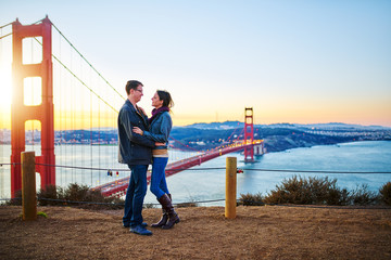 couple together at golden gate bridge in love