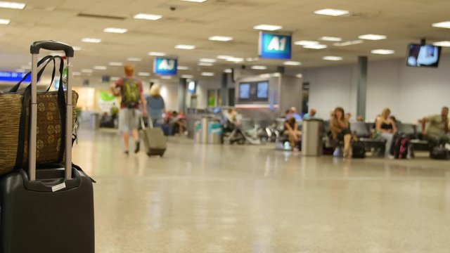 Travelers in airport at night