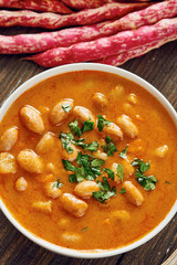 Bean soup in white bowl