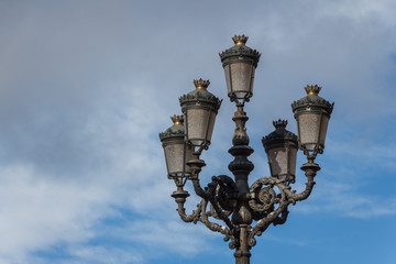 Fototapeta na wymiar Old lantern in the center of Madrid, Spain