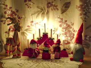 Traditional Xmas decoration on table with electric candelabra. Happy holidays!