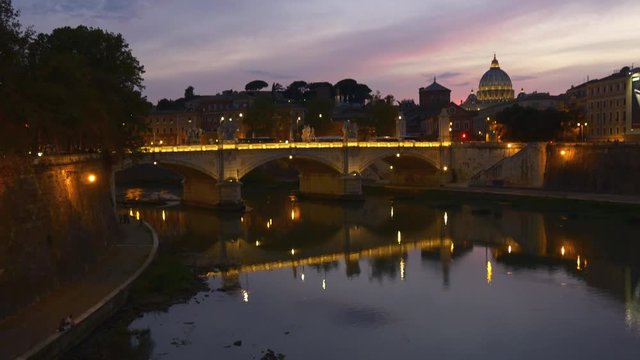sunset night illumination rome tiber river reflection vatican panorama 4k italy

