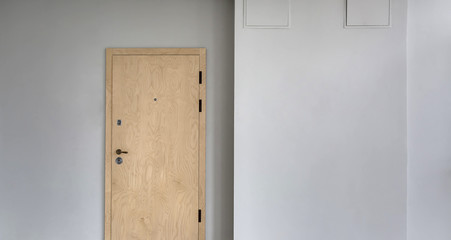 Wall with wooden door