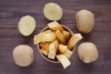 Homemade french fries raw organic potatoes from a home garden