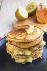 Pancakes of yam and kiwi