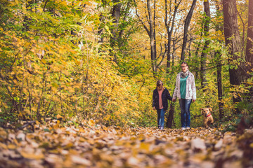 Fototapeta premium Mother and daughter hiking in a forest