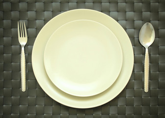 Plate mat with fork and knife for background