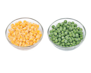 Frozen organic peas and corn bowl isolated on white background