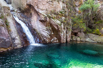 Waterfall in Bei Jiu Shui trail in Autumn, Laoshan Mountain, Qingdao, China. Bei Jiu Shui is famous for the many pools of crystal clear water and it's waterfalls