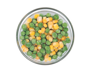 Frozen organic peas and corn bowl isolated on white background