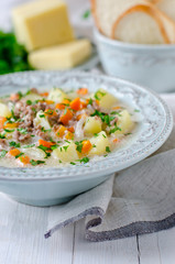 Cheese soup with vegetables and minced meat