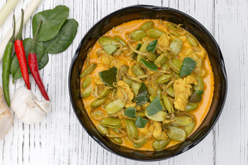 curry chicken parkia timoriana  spicy taste on wood table, thai food