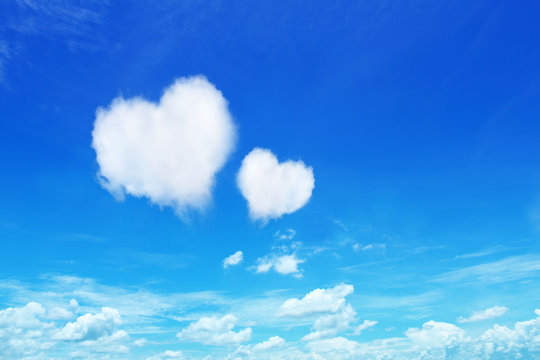 two heart clouds on blue sky