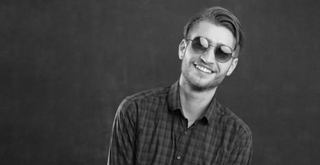 Young man in studio looking at camera