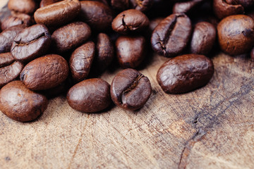 Coffee Bean on wood background with filter effect retro vintage
