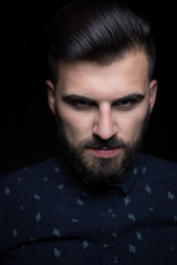 Obraz premium Portrait of the male over black background