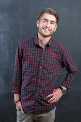 Young man in studio looking at camera