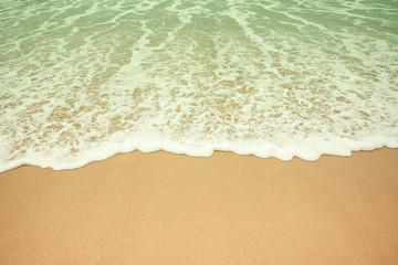 Fototapeta na wymiar Sunset beach and wave