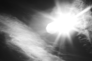 Horizontal black and white sun flare background