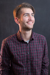Fototapeta premium portrait of young startup businessman at modern office, chalkboa