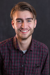 portrait of young startup businessman at modern office, chalkboa