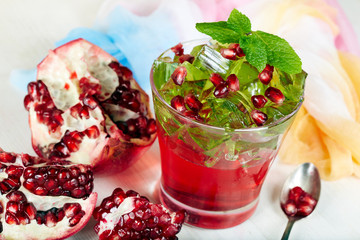 Delicious red and green jelly dessert and pomegranate