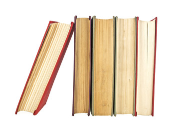 Stack of old books isolated on white background