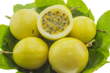 Ripe yellow passion fruits isolated on white background