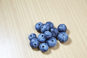 blueberries on wooden table