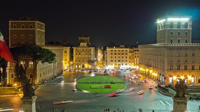 night illumination rome city square piazza venezia traffic circle panorama 4k time lapse italy
