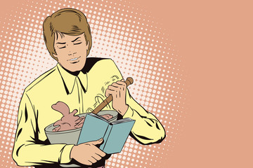 Young man stirs dough for cookies.