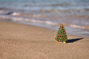 Candy canes on the beach. holiday vacation concept